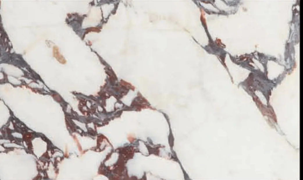 Arabescato slab, white ground broken by deep burgundy and violet veins